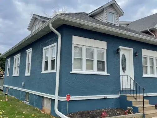 Blue house with white trim and front porch